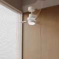 White Ceiling Fan With Transparent Blades Near Window With White Blinds And Wooden Wall