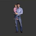 Happy Child in Pink Top Being Held by Father in Blue Shirt Against Gray Background