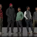 Five Men Standing Together In Different Casual Outfits On Black Background