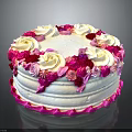 Beautifully Decorated Cake With Pink And White Cream Roses On Top