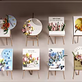 Interactive Area Display With Multiple Easels And Decorative Paintings Featuring Flowers Butterflies Letters