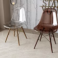 Transparent and Brown Dining Chairs with Acrylic Material and Metal Legs in Modern Home Interior