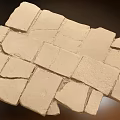 Natural Stone Ground Paving with Irregular Beige Slabs and Seam Details