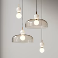 Modern Pendant Lights With Transparent Glass Domes and Spherical Light Bulbs