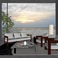 Modern Living Room Sofa And Coffee Table Set With Ocean View Sunset And Green Plant