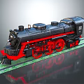 Black And Red Electric Toy Train With Large Wheels Moving On Green Track