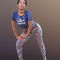 Stylish Woman Wearing Blue Adidas T Shirt And Floral Print Leggings Bending Forward