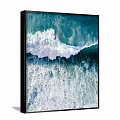 Aerial View Of Ocean Waves Crashing With White Foam And Blue Water