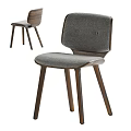 Modern Accent Chair Featuring Gray Fabric Upholstery And Wooden Legs With Curved Design