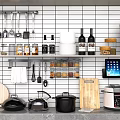 Hanging Kitchen Utensils and Cookware with Spice Jars Wooden Cutting Boards on White Grid Wall