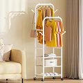 White Rolling Clothes Rack With Hanging Dresses Handbag Drawer And Shoes In Living Room