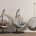 Three Modern Indoor Hanging Chairs With Rattan Transparent And Cushioned Designs