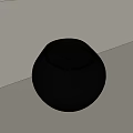 Stylish Round Black Stool With Smooth Surface On Light Colored Background