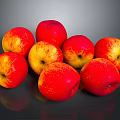 Fresh Red And Yellow Apples Stacked On Dark Background With Shiny Skin