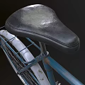 Teal Vintage Bicycle With Gray Seat And Spoked Wheels In Retro Style