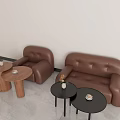 Modern Brown Leather Sofa Combination With Side Tables And Flower Vases In Living Room
