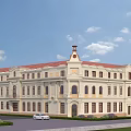 European Style Building Exterior with Cream Exterior Red Roof Clock Tower Front Lawn and White Car