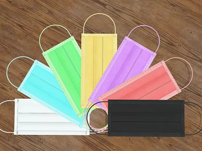 Various Colored Disposable Face Masks With Ear Loops On Wooden Background 3d model