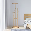 Wooden Tree Shaped Coat Rack In Modern Bedroom With Bed And Curtains