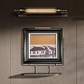 Elegant Wall Decor With Framed Artworks And Sconce Lighting On Wooden Panel
