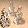 Decorative Ornament Set With Metallic Intricate Latticework And Twisted Spiral Design On Wooden Floor