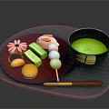 Assorted Japanese Traditional Sweets With Colorful Shapes On Red Tray And Matcha Bowl