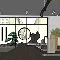Traditional Chinese Tea Room Interior With Large Windows Bonsai Tree Stone Decorations And Wooden Countertop