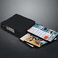 Open Black Storage Box With Neatly Stored Magazines And Printed Materials 3d model