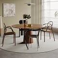 Modern Round Dining Table Set With Accent Chairs Vase Plants Window Blinds And Wall Art
