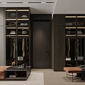 Modern Walk-in Closet With Dark Wooden Cabinets Hanging Areas Folding Shelves Bench And Decorative Items
