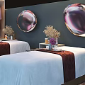 Massage Beds with White Sheets Red Trim Purple Robes and Green Plants in Modern Spa Room