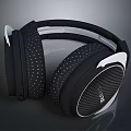 Black And White Computer Headphones With Dotted Earmuffs And RIG Logo