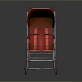 Red Baby Stroller With Red Canopy And Metal Frame On Reflective Surface