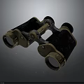 Vintage Black and Gold Binoculars With Metal Components And Classic Design