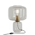 Double Transparent Glass Table Lamp Featuring Gold Brass Accents And Exposed Bulb