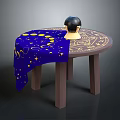 Round Wooden Table With Blue Tablecloth Featuring Yellow Stars And Moon Patterns And Celestial Globe