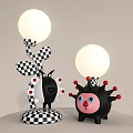 Two Creative Table Lamps With Black White Checkered Design Red Decorations And Spherical Shades