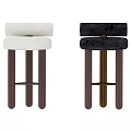 Modern Upholstered Stools With Black And White Seats And Brown Wooden Legs