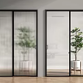 Modern Glass Sliding Doors With Black Frame In Indoor Space And Green Plant