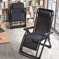 Modern Study Room Interior With Bookshelves Desk Laptop Ergonomic Chair And Green Plant