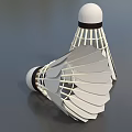 Two White Badminton Shuttlecocks With Feather Structure And Black Rubber Heads
