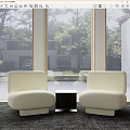 Beige Casual Sofa Set With Modern Minimalist Design And Small Coffee Table By Large Windows With Green Trees View