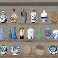 Various Ceramic Vessels Displayed On Wooden Shelves With Blue And White Patterns And Different Shapes
