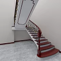 Curved Staircase with Dark Red Steps Black Railings Golden Decorations White Walls and Gray Floor