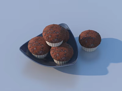 Chocolate Muffins With Chocolate Chips In Paper Cups On Blue Plate And One Separate 3d model
