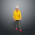 Woman with white hair wearing yellow top green pants red shoes standing against gray background