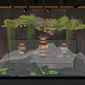 Indoor Landscape Featuring Hanging Green Vines Purple Flowers Pagoda Lanterns Mist Stones And Water Flow