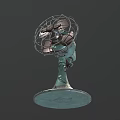 Vintage Electric Fan with Metal Cage Worn Green Base and Retro Design