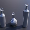 Silver Wine Bottles With Transparent Spherical Caps Arranged On Dark Background In Different Shapes