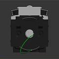 Industrial Mechanical Equipment With Yellow Coiled Cable Silver Components Black Body And Green Wire